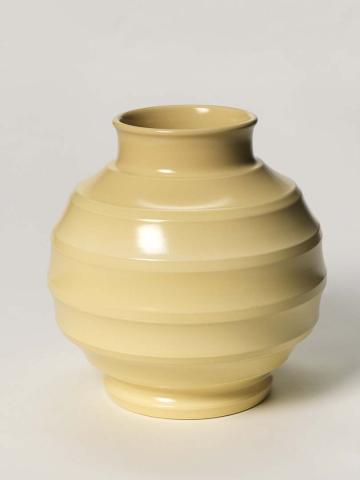 Artwork Vase this artwork made of Earthenware, spherical white body engine turned with a series of ridges and glazed matt cream