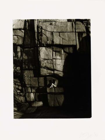 Artwork (Female nude seated on rock ledge) (from 'Magnetic Island' series) this artwork made of Gelatin silver photograph on paper, created in 1982-01-01