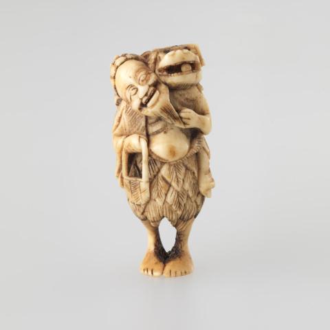 Artwork Netsuke:  (sennin (monk) with a garment of leaves) this artwork made of Carved ivory, created in 1800-01-01