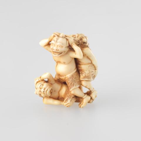 Artwork Netsuke:  (three demons) this artwork made of Carved ivory, created in 1800-01-01