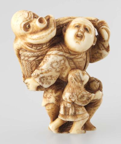 Artwork Netsuke:  (fisherman with a large octopus emerging from a basket and child at his knee) this artwork made of Carved ivory, created in 1800-01-01