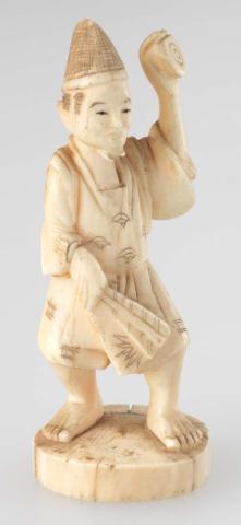 Artwork Sculpture:  (man holding an object and fan) this artwork made of Carved ivory, created in 1800-01-01