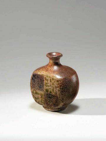 Artwork Square bottle this artwork made of Stoneware, thrown and paddled shape, fired with shell impressions on one surface. Glazed quadrant, decoration and salt glazed, created in 1974-01-01