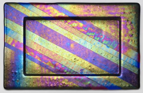 Artwork Platter this artwork made of Multicoloured glass strips, fused, slumped and iridised, created in 1987-01-01