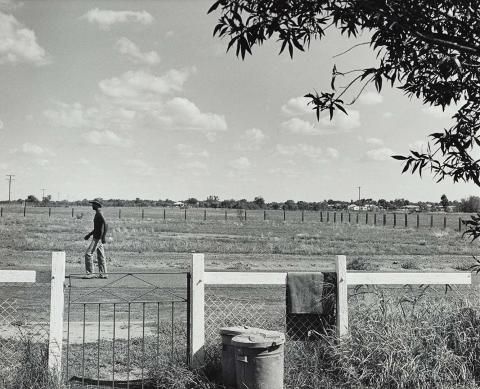 Artwork 28 March 1987, Cunnamulla - Peter the art teacher sat on his verandah and watched the traffic, ate garlic and tamarind yabbies and listened to Nick Cave (from 'Journeys north' portfolio) this artwork made of Gelatin silver photograph on paper, created in 1987-01-01