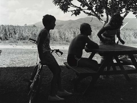 Artwork 21 January 1987, Gordonvale - The Wyatts sat in the shade of their house on a hot afternoon in the school holidays (from 'Journeys north' portfolio) this artwork made of Gelatin silver photograph on paper, created in 1987-01-01