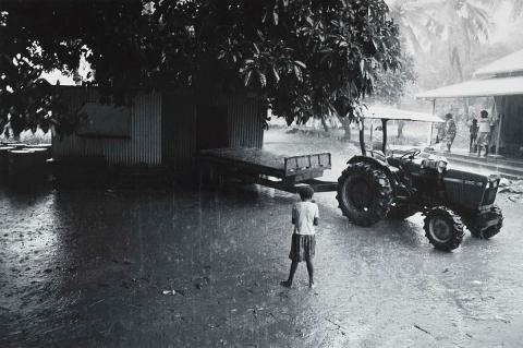 Artwork Girl and tractor, Murray Island, Torres Strait (from 'Journeys north' portfolio) this artwork made of Gelatin silver photograph on paper, created in 1987-01-01