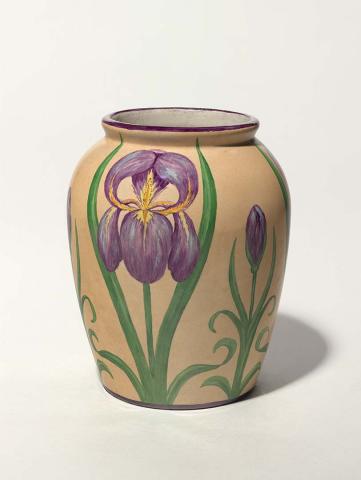 Artwork Vase this artwork made of China painting on earthenware squat baluster shape decorated in green, yellow and purple overglaze enamels with three iris and leaf motifs against a buff ground.  Purple rim, created in 1934-01-01