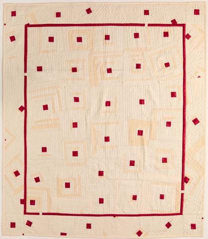 Artwork Quilt:  It's not all sweetness and light this artwork made of Plain cream commercial cotton and red glazed chintz in non-traditional 'log cabin' patchwork, created in 1983-01-01