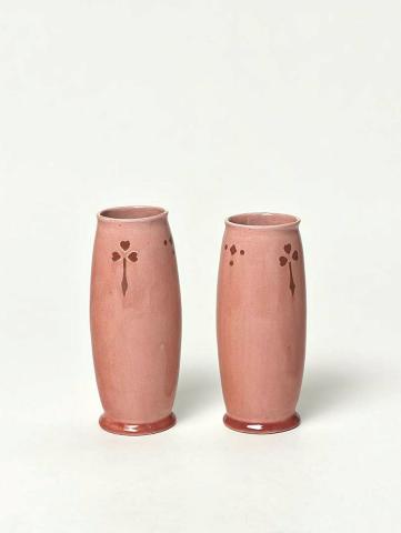 Artwork Pair of vases this artwork made of Hand-built swelling cylindrical form inlaid with heart and diamond motifs in brown with pink glaze, created in 1919-01-01