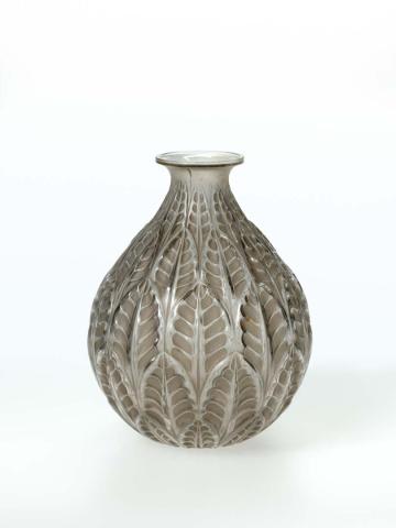 Artwork Vase:  Malsherbe this artwork made of Mould blown grey glass with a design of acanthus leaves.  Stained grey, created in 1920-01-01