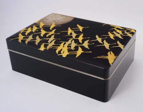 Artwork Box for holding correspondence (fumi-bako) this artwork made of Black lacquerware with silver alloy frame, decorated with design of 'a thousand cranes' in gold and silver leaf, created in 1980-01-01