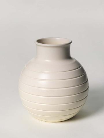 Artwork Spherical vase this artwork made of Earthenware, thrown and engine turned with a series of ridges, with moonstone glaze