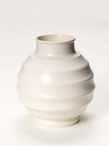 Artwork Spherical vase this artwork made of Earthenware, thrown and engine turned with prominent ribs, with moonstone glaze
