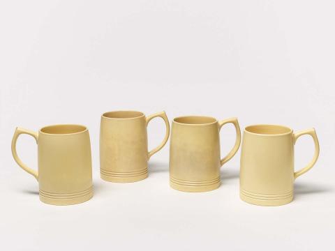 Artwork Beer mugs (set of four) this artwork made of Earthenware, thrown, with engine turned foot, with straw coloured glaze