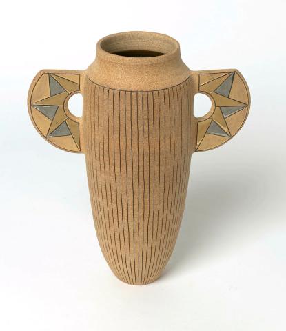 Artwork Winged vase:  Sunrise this artwork made of Reddish buff stoneware clay, wheelthrown in tall calyx shape incised with lines. The lugs with silver and gold details and interior glazed brown, created in 1990-01-01