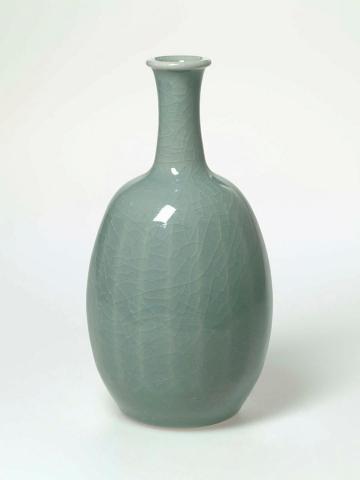 Artwork Bottle vase this artwork made of Porcelain, thrown, with 20 wire cut facets and crackled blue celadon glaze, created in 1989-01-01