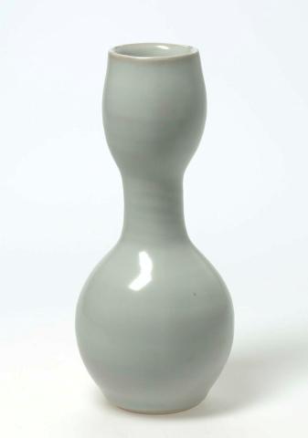 Artwork Dumbell shaped vase this artwork made of Porcelain, thrown with milky green kuan style glaze, created in 1988-01-01