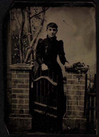 Artwork (Portrait of a young woman) this artwork made of Tintype on iron, created in 1865-01-01