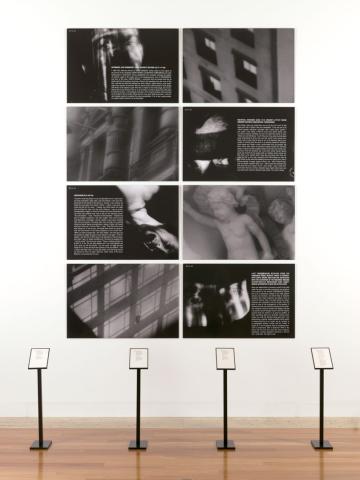 Artwork Malebolge (from 'Diario per una vita nuova' series) (Pit of evil (from 'Diary for a new life' series)) this artwork made of Variable installation comprising a group of eight gelatin silver photographs on paper with four timber lecterns and one audio tape, created in 1990-01-01