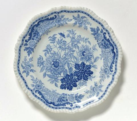 Artwork Plate:  Jasmine this artwork made of Earthenware plate with gadrooned edge transfer printed in underglaze cobalt, created in 1825-01-01