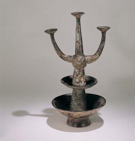 Artwork Candelabrum this artwork made of Earthenware, wheelthrown and hand built with manganese glaze in three sections, created in 1957-01-01