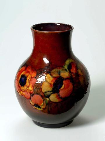 Artwork Large vase:  (Anemones) this artwork made of Stoneware, wheelthrown and flambé deep red glaze shaded cobalt with slip cell decorations and red, yellow and cobalt glaze, created in 1946-01-01