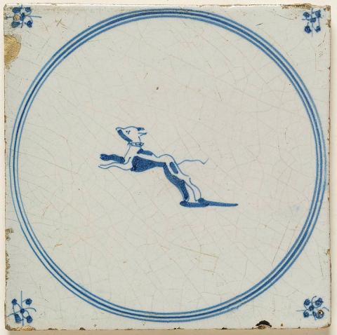 Artwork Tile:  Springertjes (Leaping dog) this artwork made of Earthenware, slab rolled and tin glazed with cobalt decoration, created in 1700-01-01