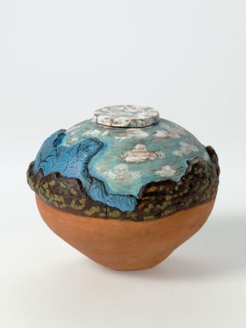 Artwork Pot:  Pmere Nuka (My country) this artwork made of Earthenware, hand-built terracotta clay with underglaze colours and applied decoration, created in 1994-01-01