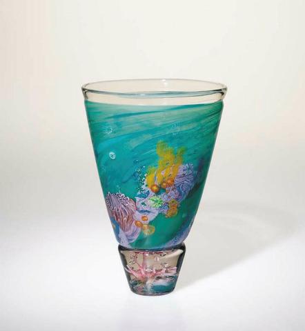 Artwork Vase:  Reef this artwork made of Hot-worked glass striated blue and aqua, with multicoloured cane inclusions, the foot with glass, foil and air bubble inclusions, created in 1995-01-01
