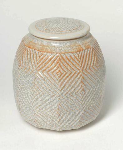 Artwork Covered jar this artwork made of Porcelain, wheelthrown and wire cut with twelve facets and Shino type glaze, created in 1994-01-01