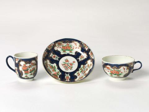 Artwork Trio:  Rich Kakiemon this artwork made of Soft-paste porcelain, mazarine ground, reserved panels with polychrome overglaze decoration and gilt detail, created in 1765-01-01