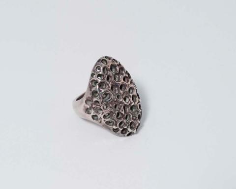 Artwork Ring: (craters) this artwork made of Sterling silver, created in 1973-01-01
