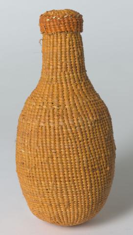 Artwork (Bottle form) this artwork made of Woven pandanus, created in 2000-01-01