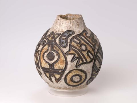 Artwork Pot:  (Guiree story - flying fox twins story) this artwork made of Stoneware, hand-built, with slip and oxide decoration on incised design, created in 1980-01-01