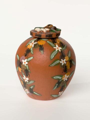 Artwork Pot: (Ant on climbing plant) this artwork made of Earthenware, hand-built terracotta clay with underglaze colours and applied decoration, created in 2002-01-01