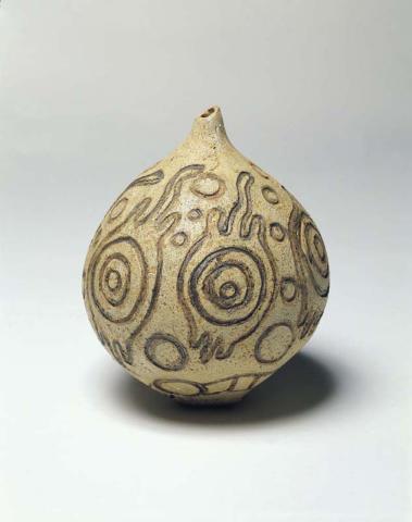 Artwork Pot:  (Orinde the tortoise) this artwork made of Stoneware, hand-built, with oxide decoration on incised design and rubbed glaze, created in 1990-01-01