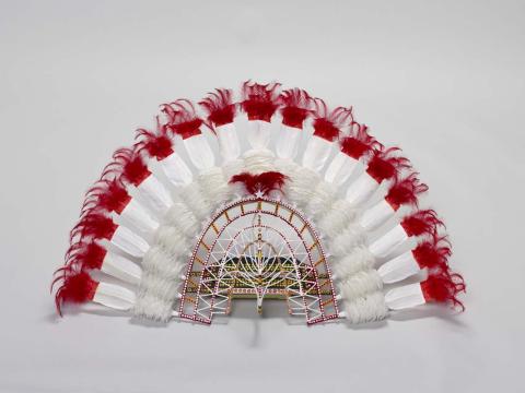 Artwork Dhibal (Victory headdress) this artwork made of Cane, feathers, cotton cloth, cotton thread, synthetic polymer paint, created in 2003-01-01