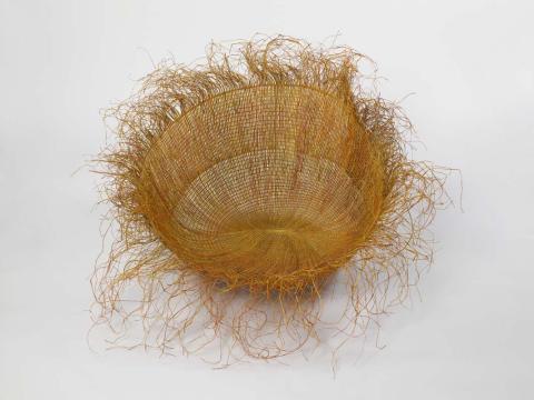 Artwork Nganiyal (conical form) this artwork made of Twined pandanus palm leaf (Pandanus spiralis) with natural dyes, created in 2002-01-01