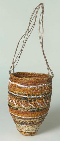 Artwork Conical basket this artwork made of Coil-woven pandanus palm leaf (Pandanus spiralis), natural dyes and natural pigments with bark fibre string, created in 2002-01-01