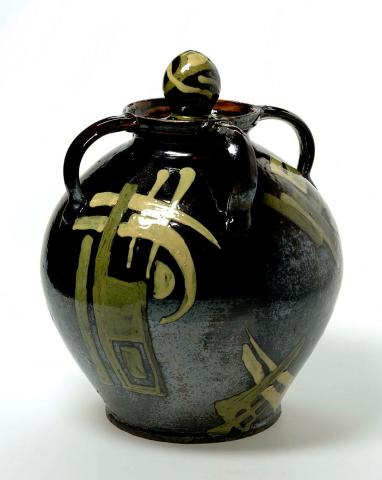 Artwork (Large four-handled urn with lid, with geometric decoration) this artwork made of Earthenware, wheelthrown, four-handled form with brown-black glaze and abstract calligraphic motifs in cream and green, created in 1948-01-01