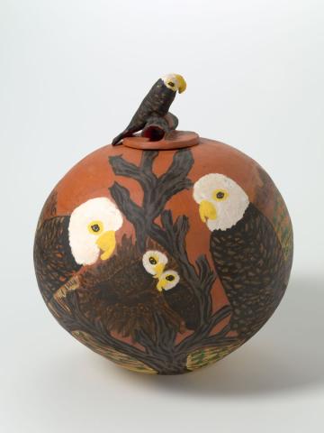 Artwork Pot:  Eeritja (Eagles) this artwork made of Earthenware, hand-built terracotta clay with underglaze colours and applied decoration, created in 1997-01-01
