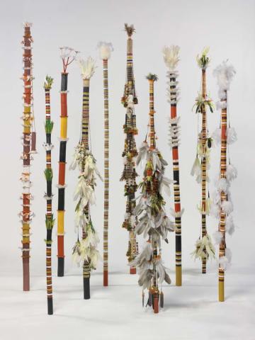 Artwork Banumbirr (Morning Star pole) this artwork made of Wood, feathers, bark fibre string, native beeswax with synthetic polymer paint