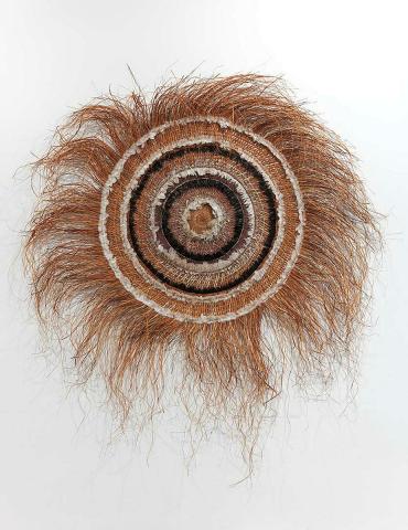 Artwork Mat this artwork made of Twined pandanus palm leaf (Pandanus spiralis), feathers with natural dyes, created in 2004-01-01