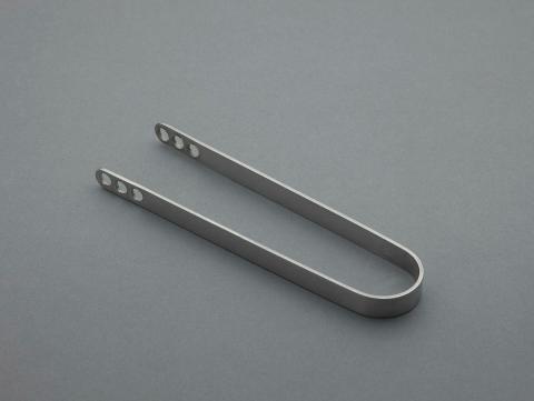 Artwork Ice tongs (from 'Cylinda Line' series) this artwork made of Polished stainless steel, created in 1964-01-01