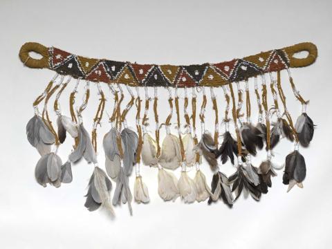 Artwork Dancing belt this artwork made of Bark fibre string with natural pigments, feathers