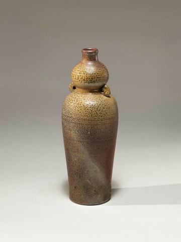 Artwork Lugged bottle, woman form this artwork made of Stoneware, wheelthrown with wood ash and salt glaze