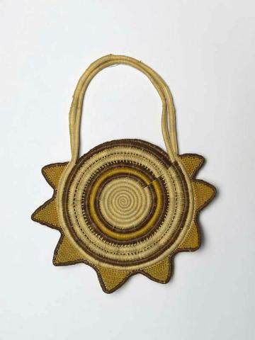 Artwork Double-sided bag this artwork made of Coil-woven and knotted pandanus palm leaf with natural dyes, created in 1960-01-01