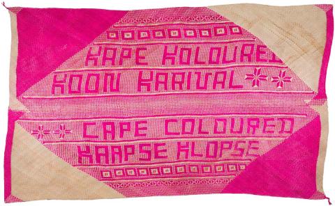 Artwork Untitled (gift mat #V) Kape Koloured Koon Karnival/Cape Coloured Kaapse Klopse this artwork made of Woven pandanus, dye, created in 2007-01-01
