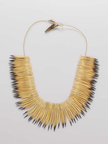 Artwork Trimanya this artwork made of Tasmanian echidna quills, hand-rolled flax fibre string with echidna claw clasp